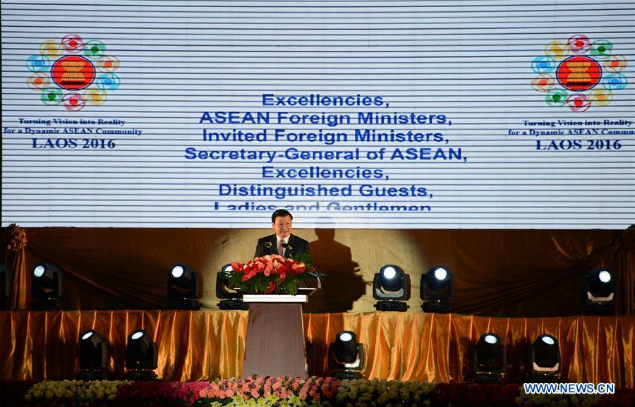 Lao Prime Minister Thongloun Sisoulith addresses the opening ceremony of the ASEAN Foreign Ministers Meeting in Vientiane, Laos, July 24, 2016.