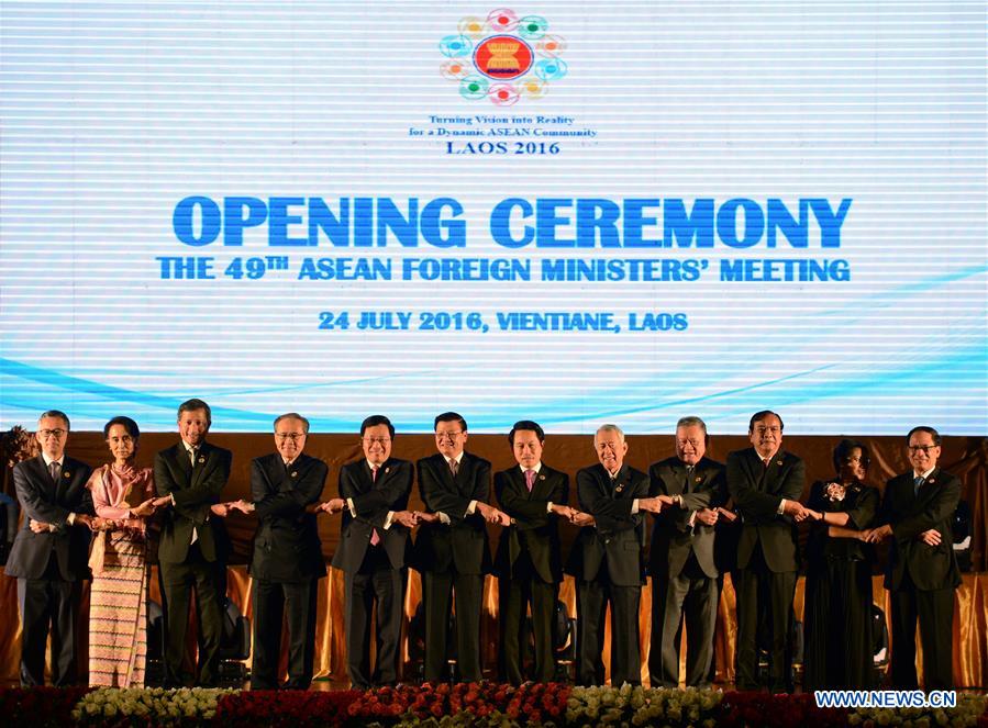 Lao Prime Minister Thongloun Sisoulith addresses the opening ceremony of the ASEAN Foreign Ministers Meeting in Vientiane, Laos, July 24, 2016.