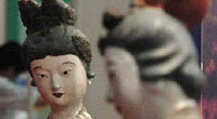 The Touching Female Servant Sculptures in the Jin Temple